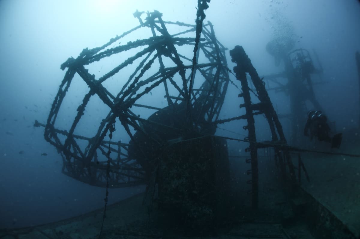 Scuba diver exploring the radar dishes of the Vandenberg wreck off Key West